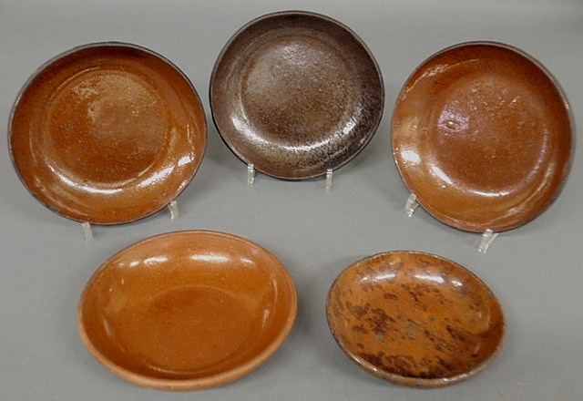 Appraisal: Five th c Pennsylvania redware pie plates largest dia