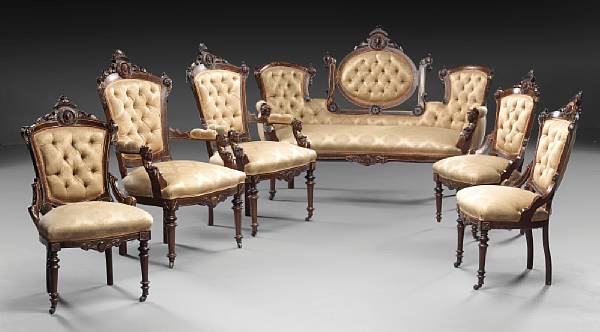 Appraisal: An American Renaissance Revival parcel ebonized and gilt carved walnut