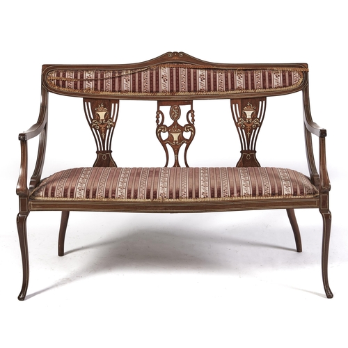 Appraisal: An Edwardian mahogany and line inlaid settee the open back