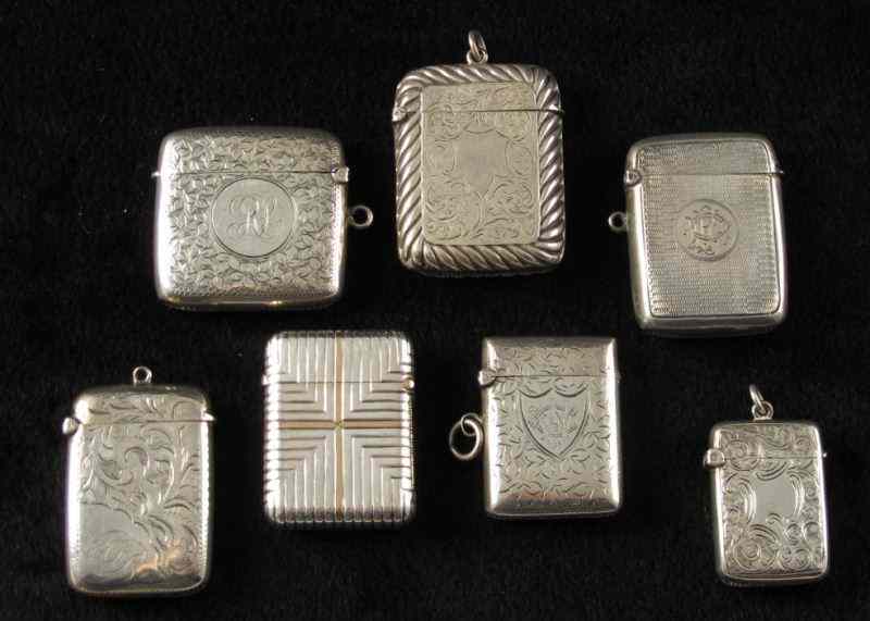 Appraisal: Group of English Sterling Match Safesthe first with bright-cut engraving