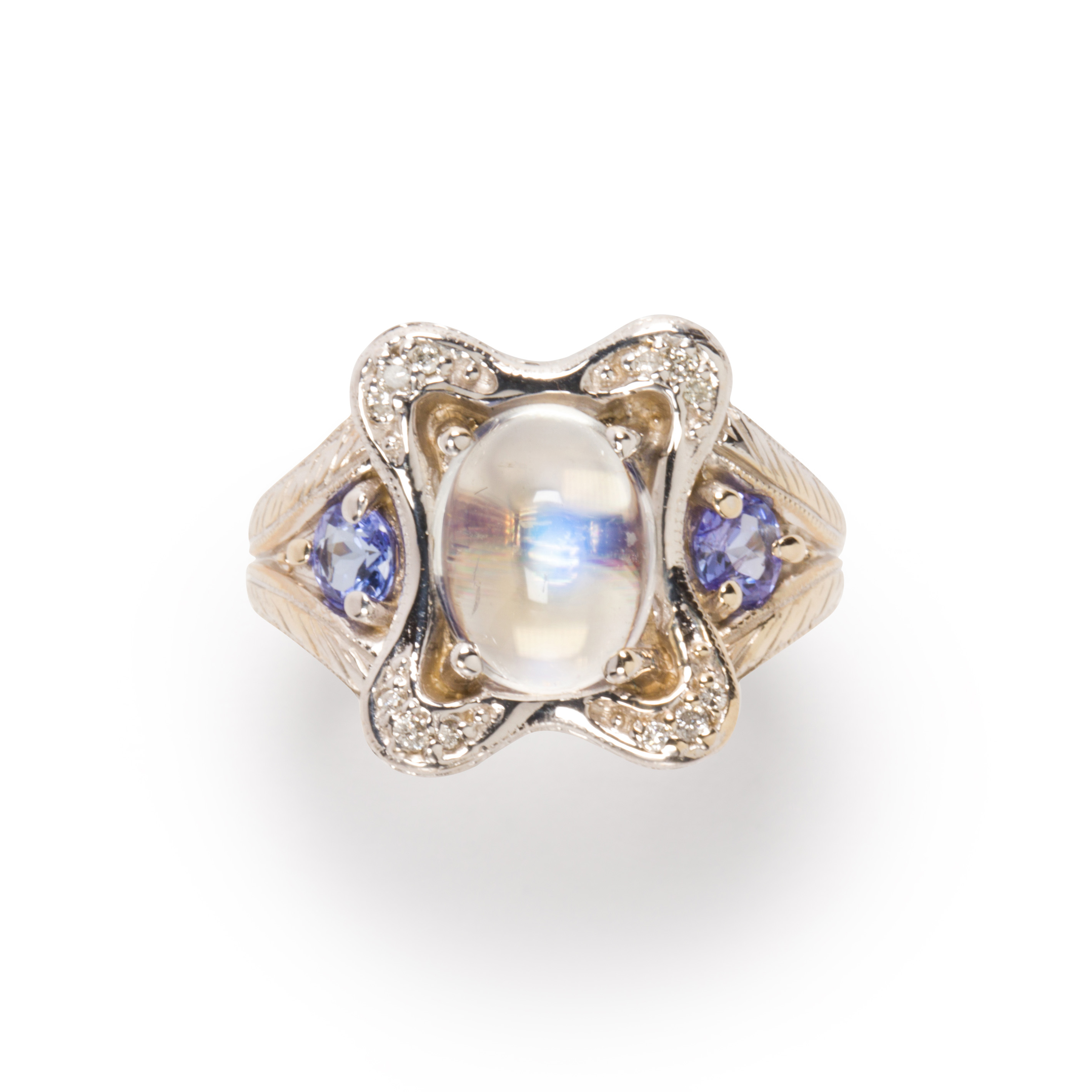 Appraisal: A GEMSTONE AND FOURTEEN KARAT WHITE GOLD RING A gemstone