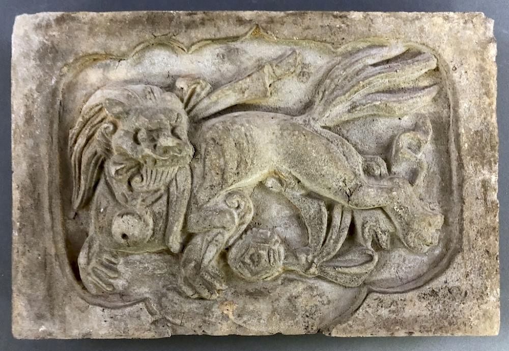 Appraisal: Chinese Gray Terracotta Tile Representing a Lion Chinese gray terracotta