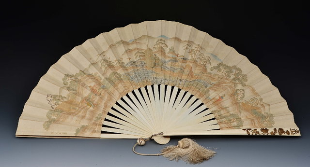 Appraisal: A Japanese ivory and paper fanMeiji periodpainted in gold and