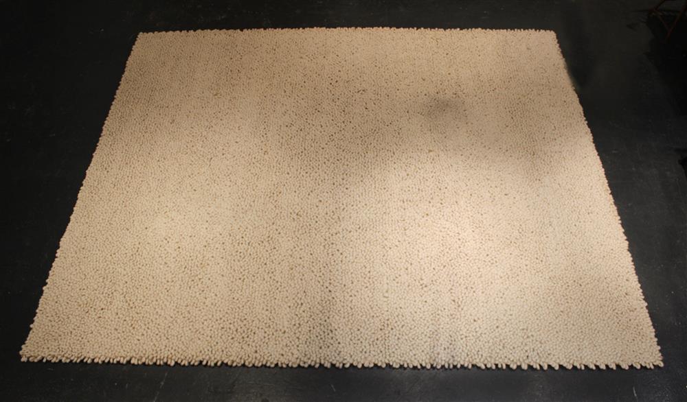 Appraisal: CONTEMPORARY CHUNKY IVORY WOOL TWISTED AND FELTED LOOP RUG ESTATE