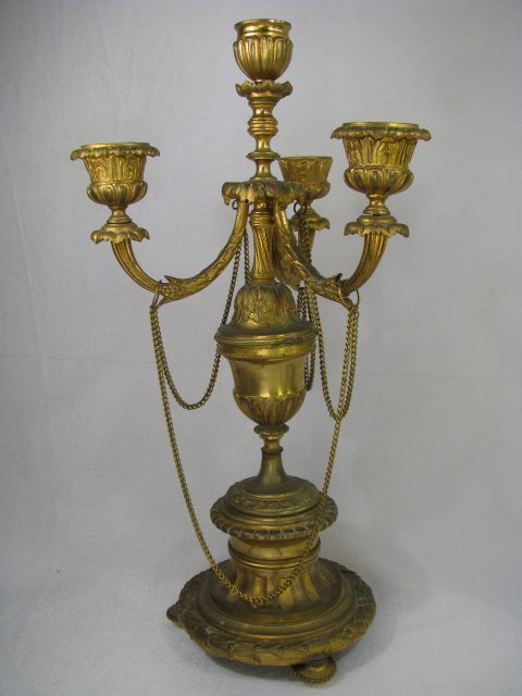 Appraisal: Candelabra holds four candles Measures high by wide Stamped numbers