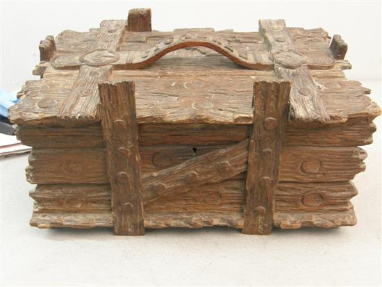 Appraisal: th century cigar box profusely carved to resemble drift wood