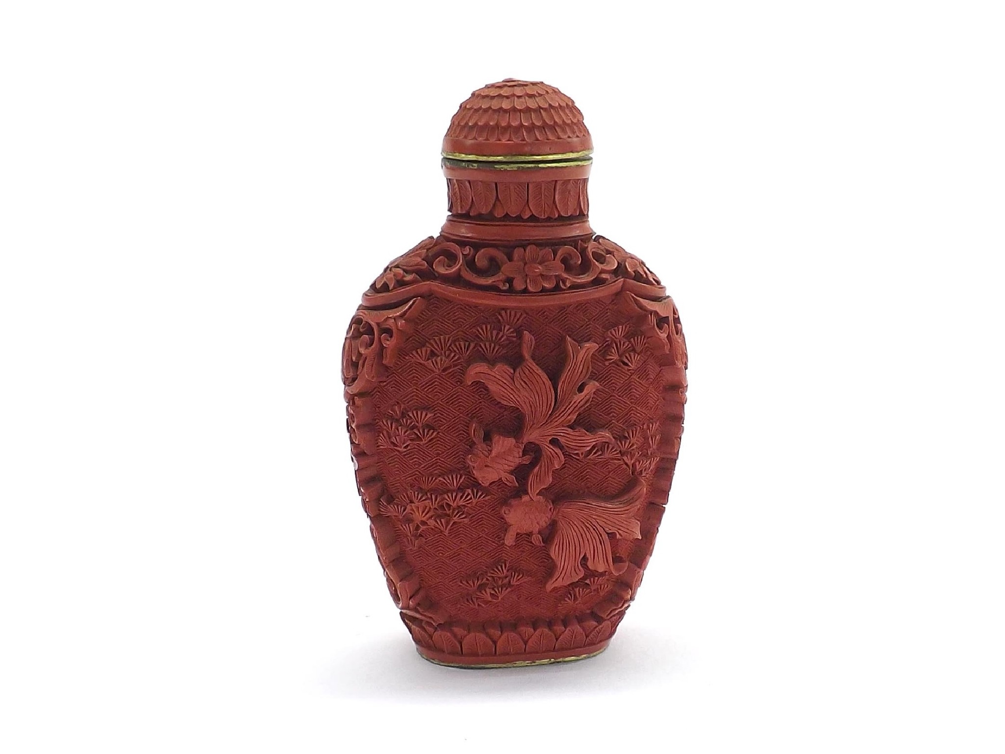 Appraisal: Cinnabar snuff bottle of flattened baluster form carved to either