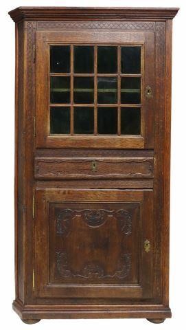 Appraisal: French Provincial oak corner cabinet th c formerly a built