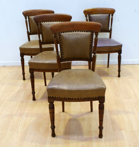 Appraisal: A set of th Century walnut and embossed leather upholstered