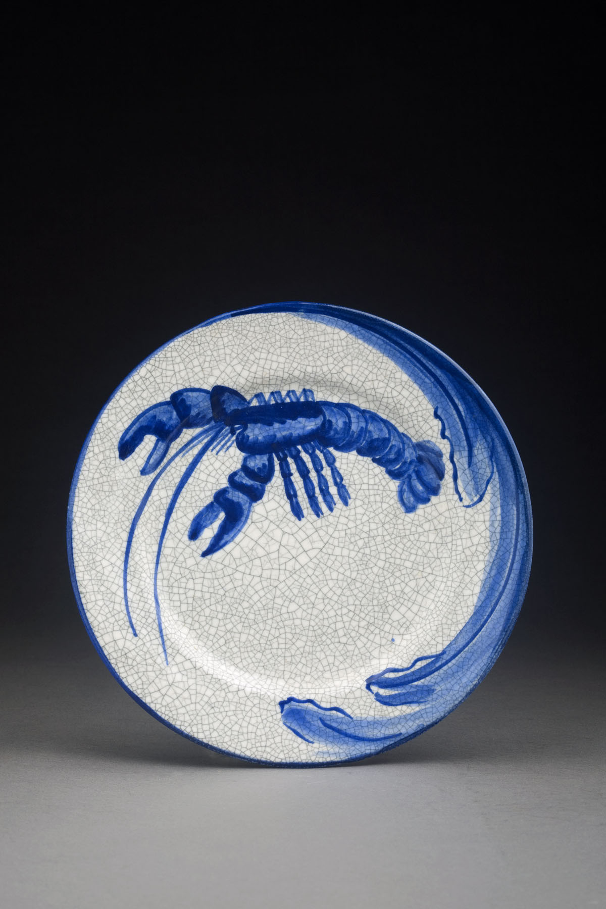 Appraisal: DEDHAM POTTERY 'LOBSTER' PATTERN PLATE Asymmetrically painted in medium and