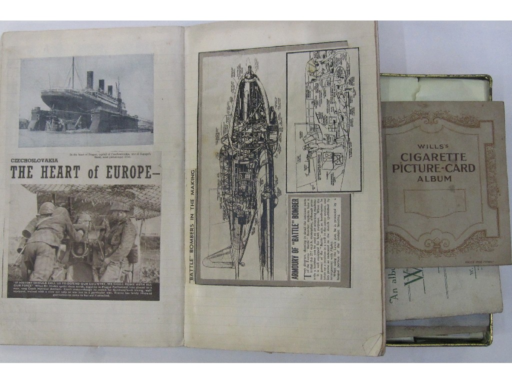 Appraisal: Lot comprising album of wartime press cuttings and assorted albums