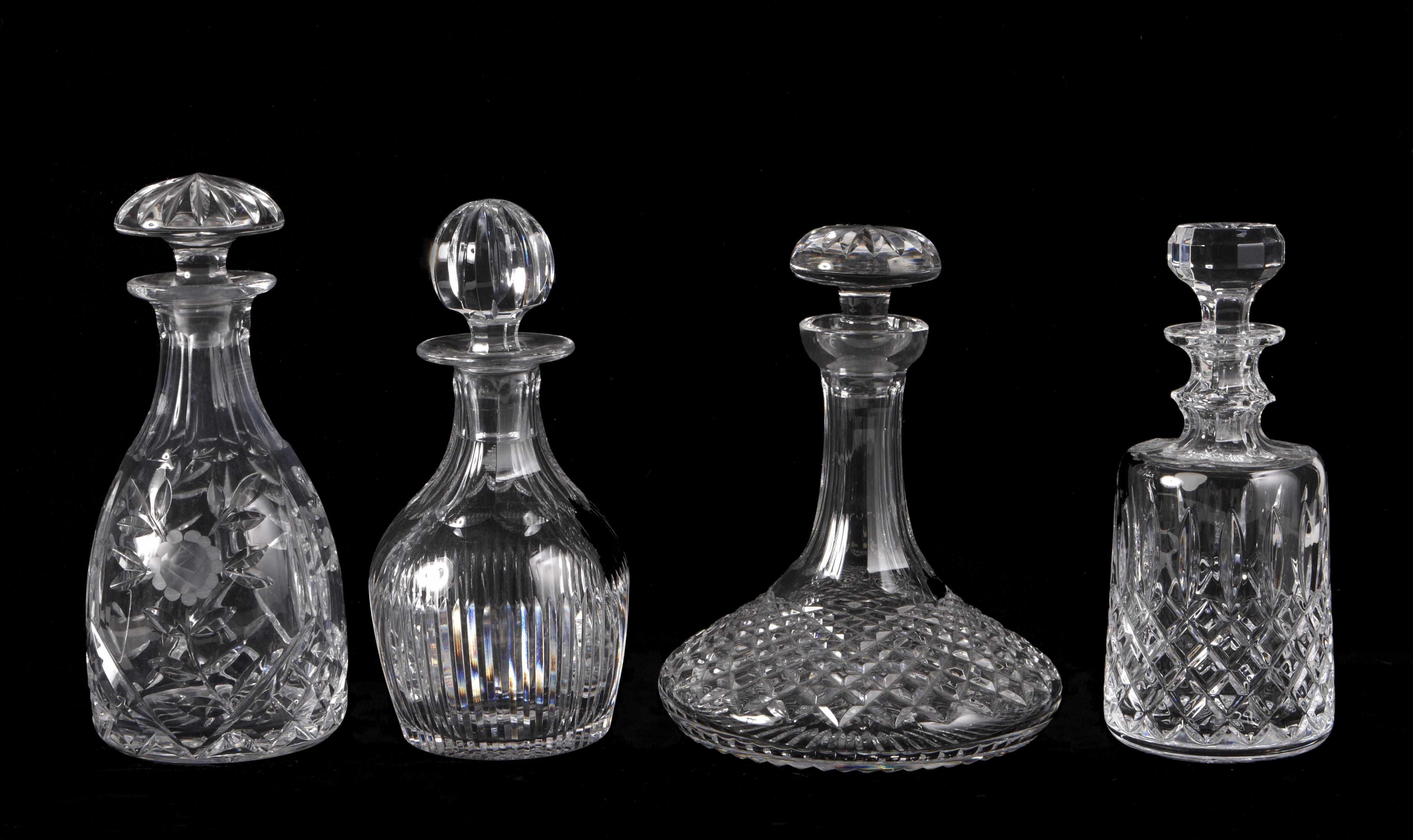 Appraisal: Two Waterford cut glass decanters and stopper a Gucci decanter