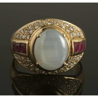 Appraisal: Gray Star Sapphire Ruby RIng k yellow gold ring containing