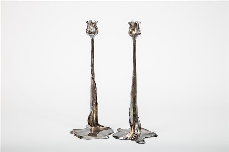 Appraisal: Pair of Art Nouveau Silvered Metal Candlesticks Unmarked bases drilled