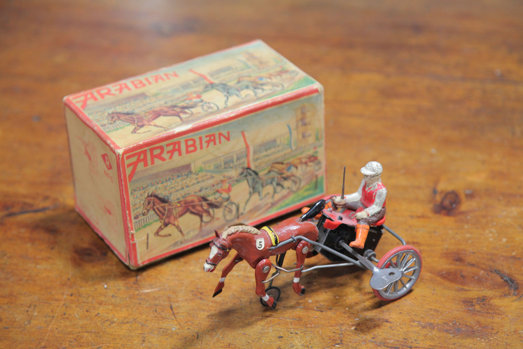 Appraisal: RUHL WIND-UP ARABIAN TROTTER WITH BOX German mid th century