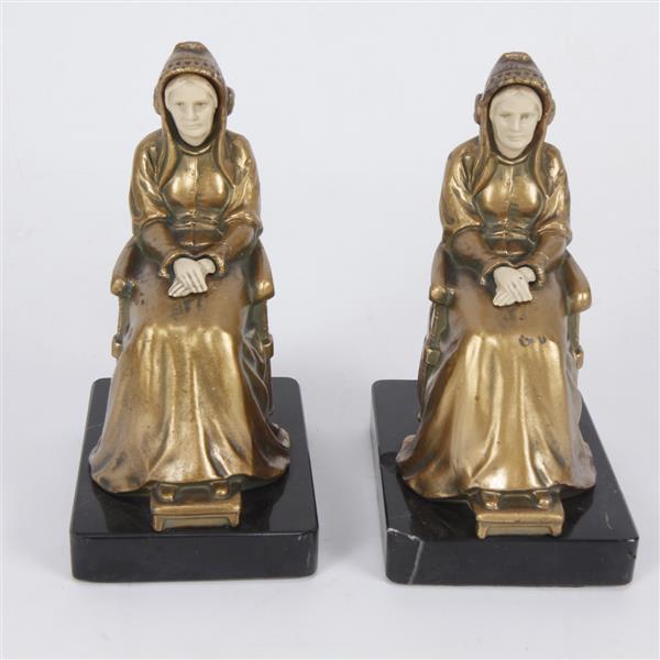 Appraisal: Antique French gilt bronze and ivory seated woman pair bookends