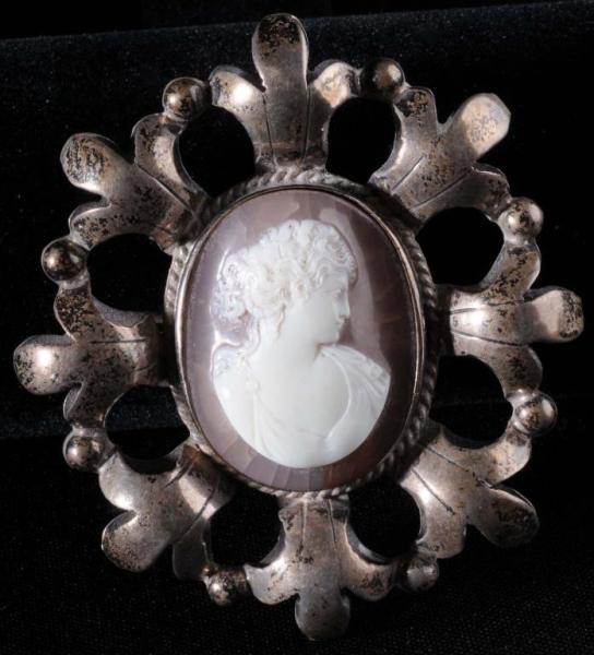 Appraisal: Mexican Pin with Early Carved Cameo Description Marked Far Fan