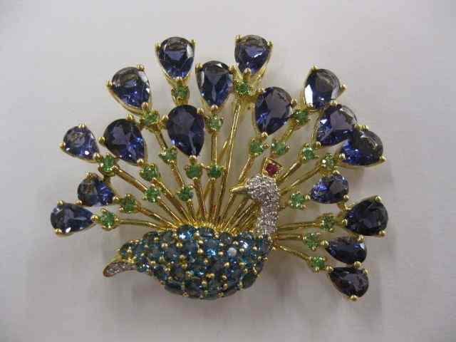 Appraisal: Figural Peacock Brooch diamond peridot blue topaz and Iolite K