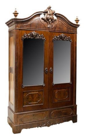 Appraisal: Monumental American Rococo Revival mahogany armoire late th early th