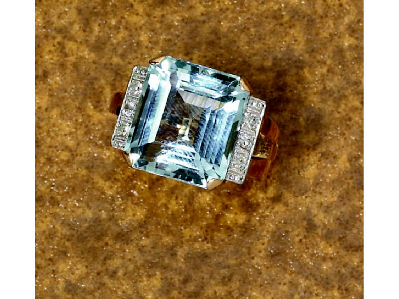 Appraisal: ROSE GOLD AQUAMARINE RING With square faceted aquamarine approximately mm