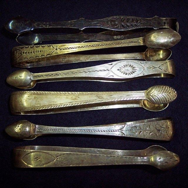 Appraisal: Six pairs of George III bright cut sugar tongs various