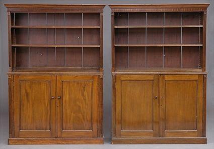 Appraisal: PAIR OF REGENCY MAHOGANY TWO-PART BOOKCASES Each molded cornice above