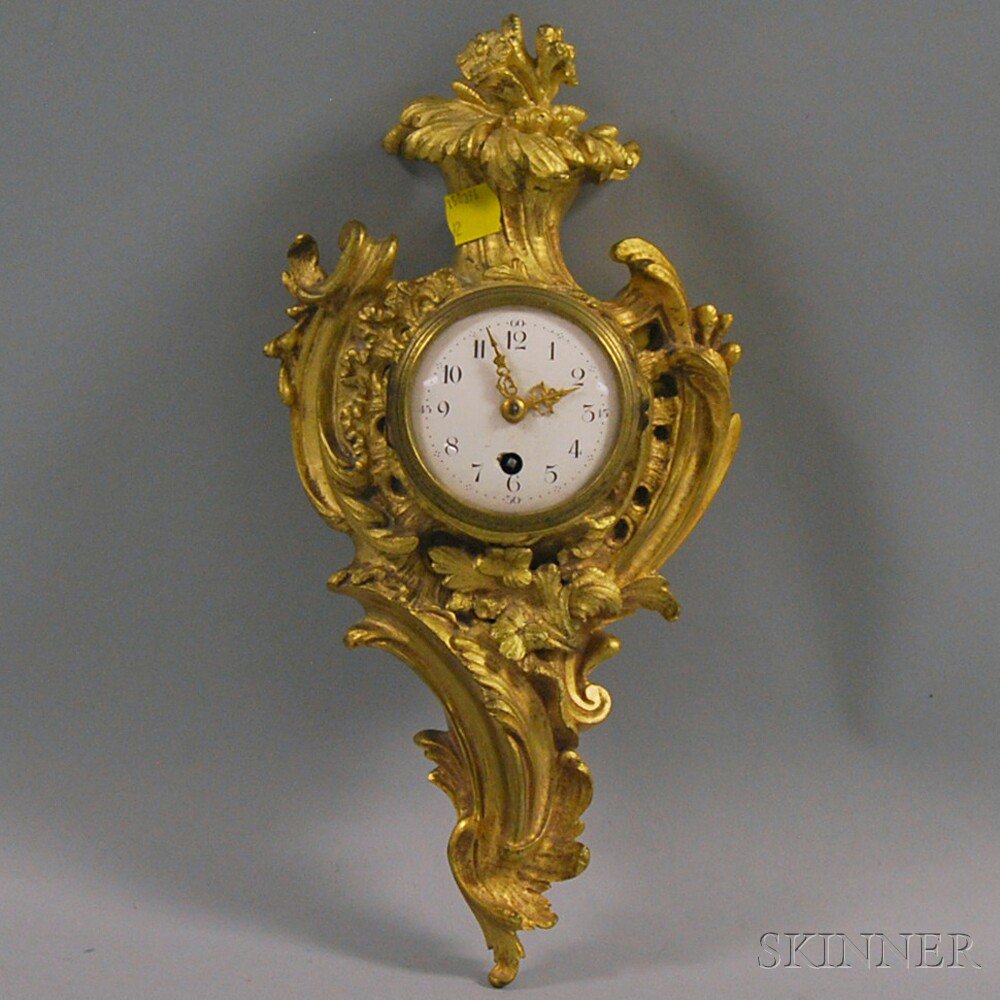 Appraisal: French Rococo-style Gilt-brass Wall Clock th century the enameled dial