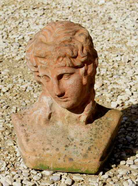 Appraisal: AN OLD TERRACOTTA BUST of a girl approximately tall