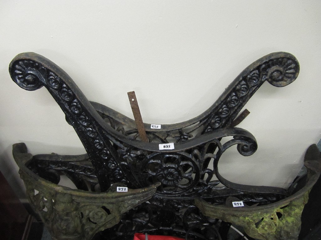 Appraisal: Pair of Victorian painted cast iron bench ends and a