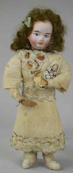 Appraisal: BISQUE HEAD INDIAN PRINCESS Germany pressed cotton figure of an