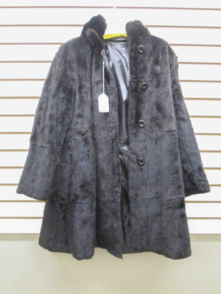 Appraisal: LADY'S HOODED REVERSIBLE RABBIT FUR RAIN COAT one side having