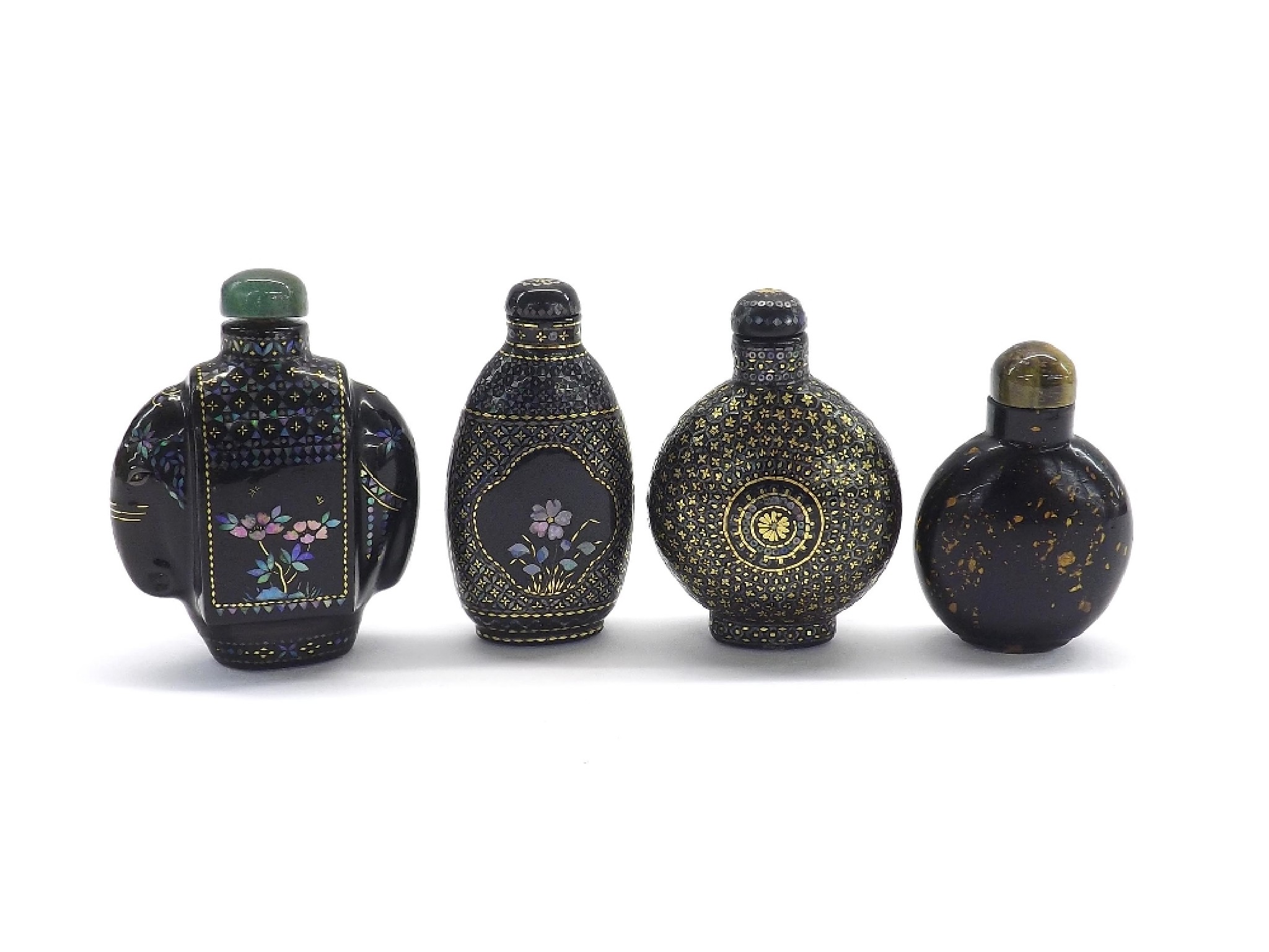 Appraisal: Four various dark glass snuff bottles with painted and gilt