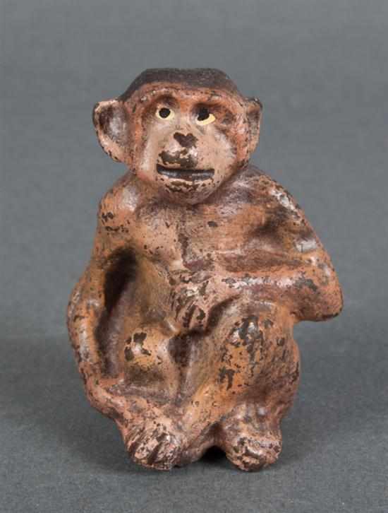 Appraisal: Austrian cold painted bronze figure of a seated monkey first