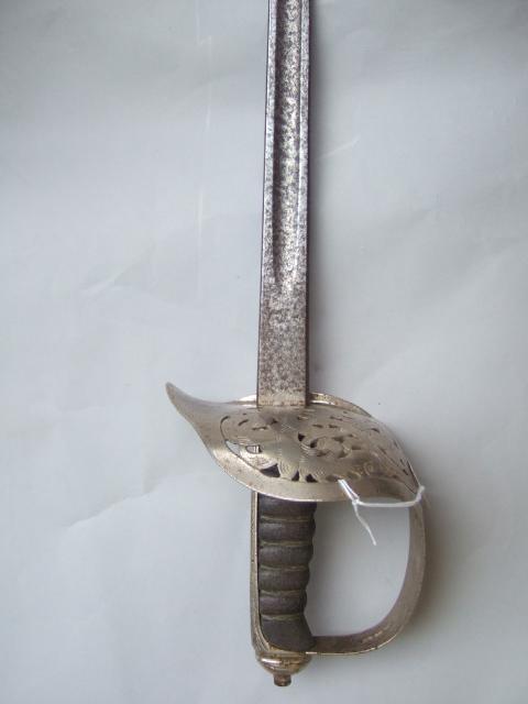 Appraisal: A Georgian officers sword with straight engraved blade cm detailed