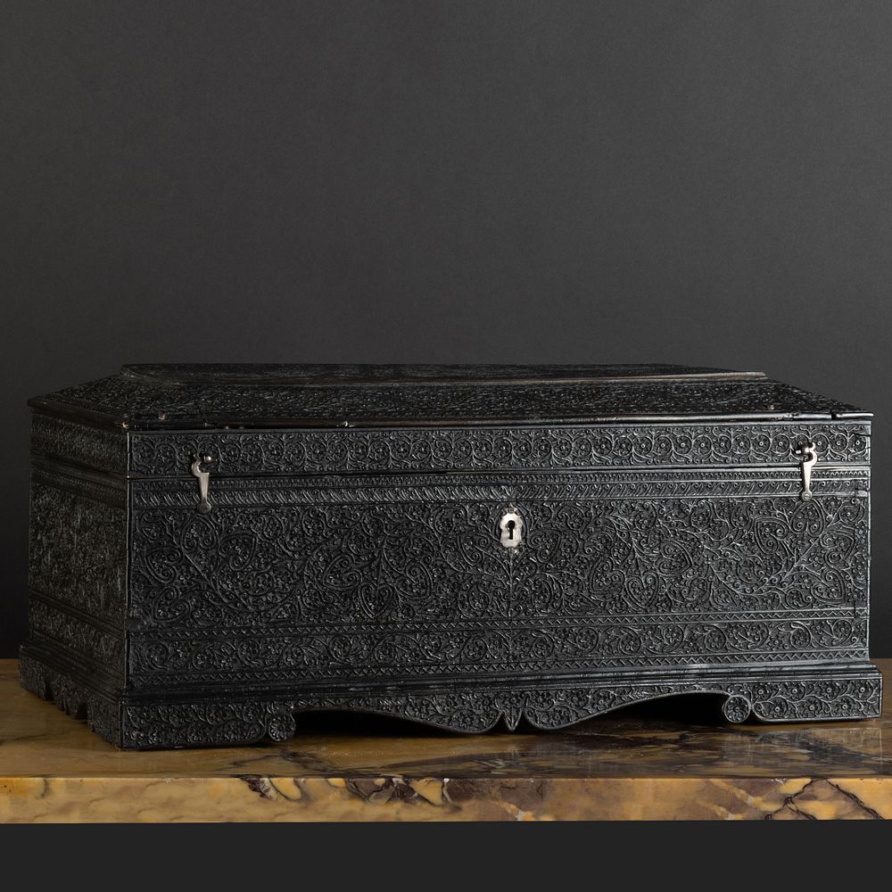 Appraisal: Anglo-Indian Carved Ebony Casket Opening to a divided interior x