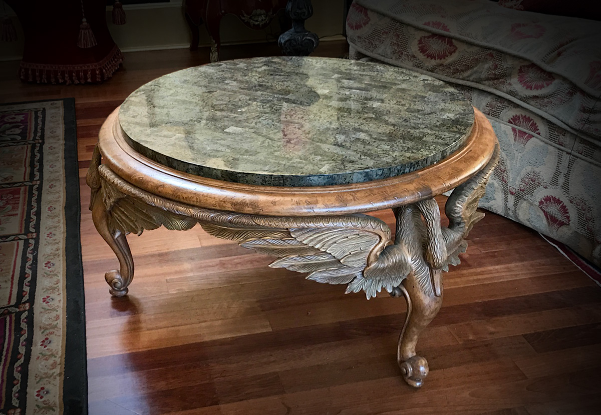 Appraisal: HORCHOW WINGED FIGURAL SWAN COFFEE TABLE Round table with stone