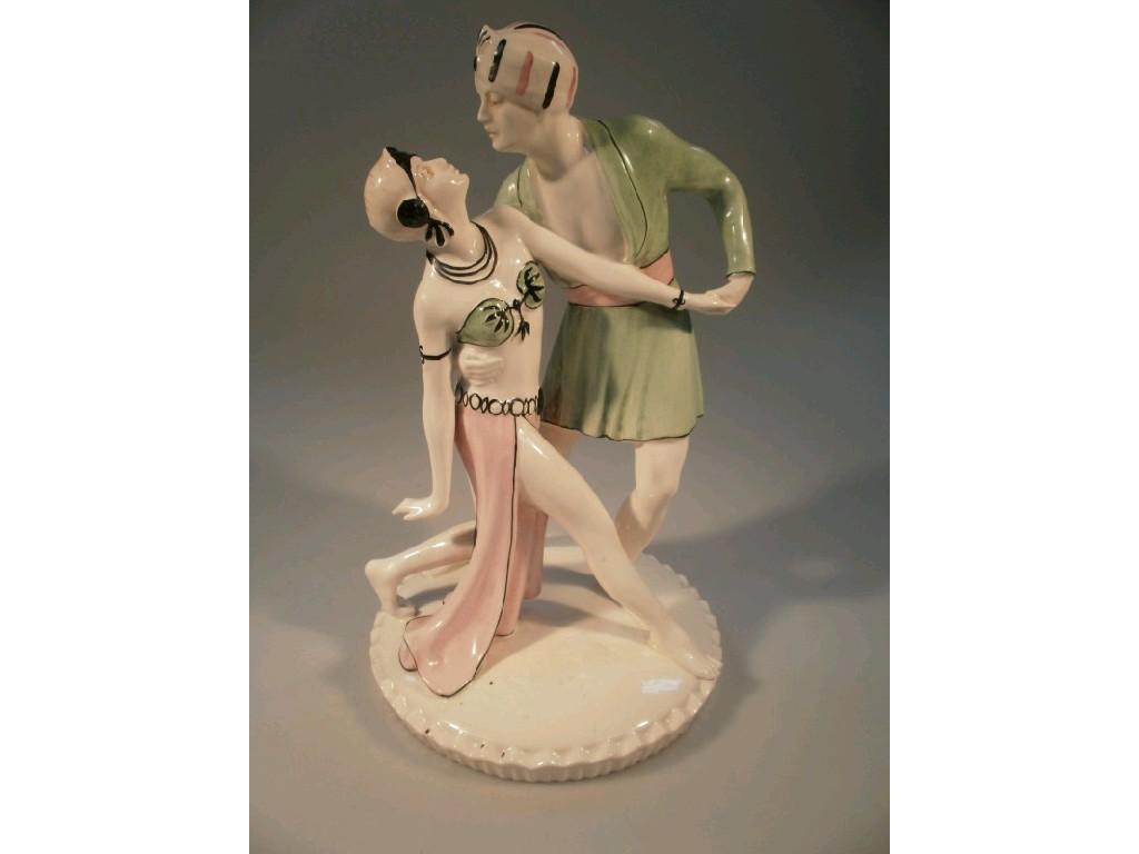 Appraisal: A 's Art Deco pottery figure group of two dancers