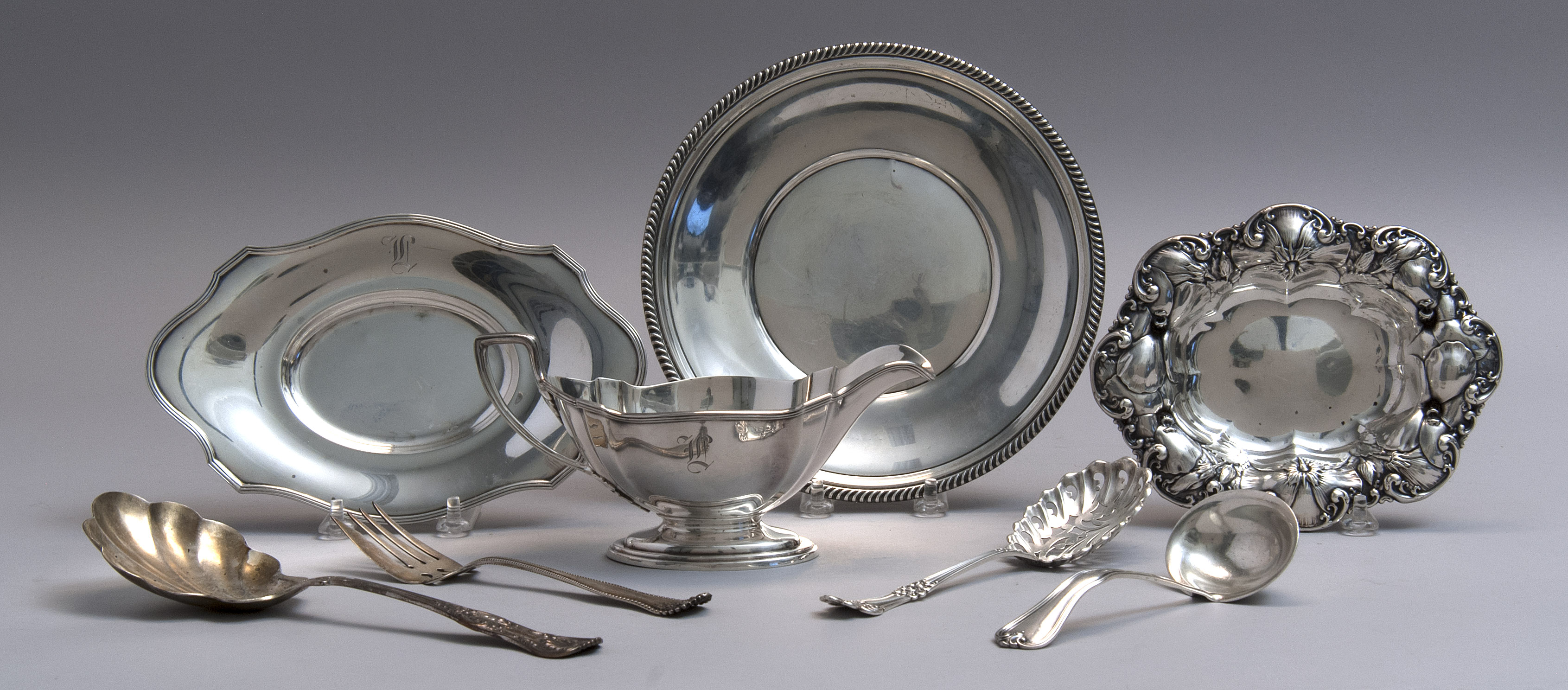 Appraisal: EIGHT PIECES OF STERLING SILVER FLATWARE AND HOLLOWWARE Includes a