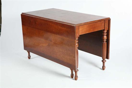 Appraisal: DROP LEAF TABLE Cherry with a rectangular top on turned