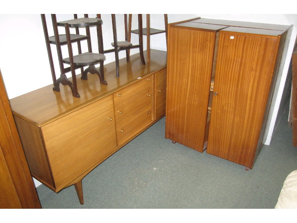 Appraisal: Lot comprising a Wylie and Lochhead sideboard and a student's