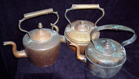 Appraisal: Three copper kettles various