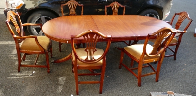 Appraisal: Reproduction Hepplewhite style extending dining table with dining chairs including