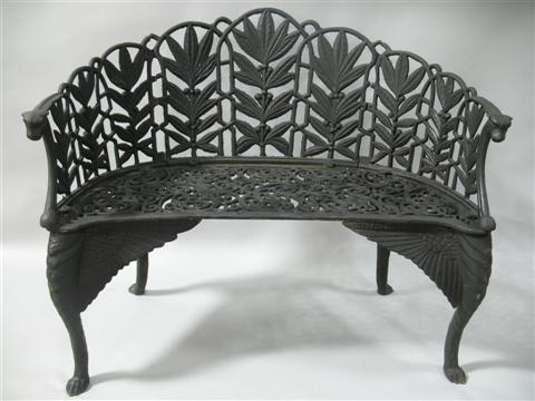 Appraisal: BLACK PAINTED CAST IRON GARDEN BENCH th century the scalloped-edged