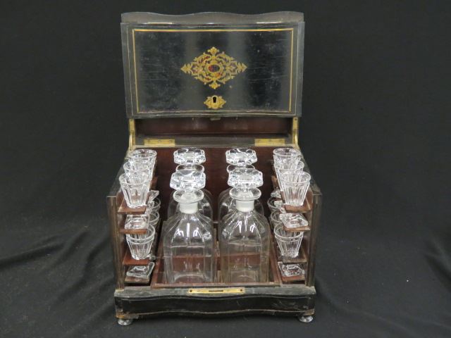 Appraisal: French Boulle Inlaid Tantalus Set cabinet opens to reveal a