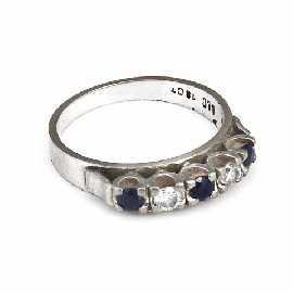 Appraisal: An ct white gold three sapphire and two diamond set