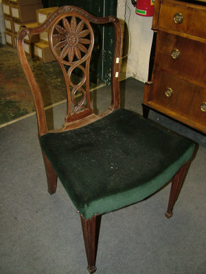 Appraisal: Three mahogany George III side chairs the shaped backs with