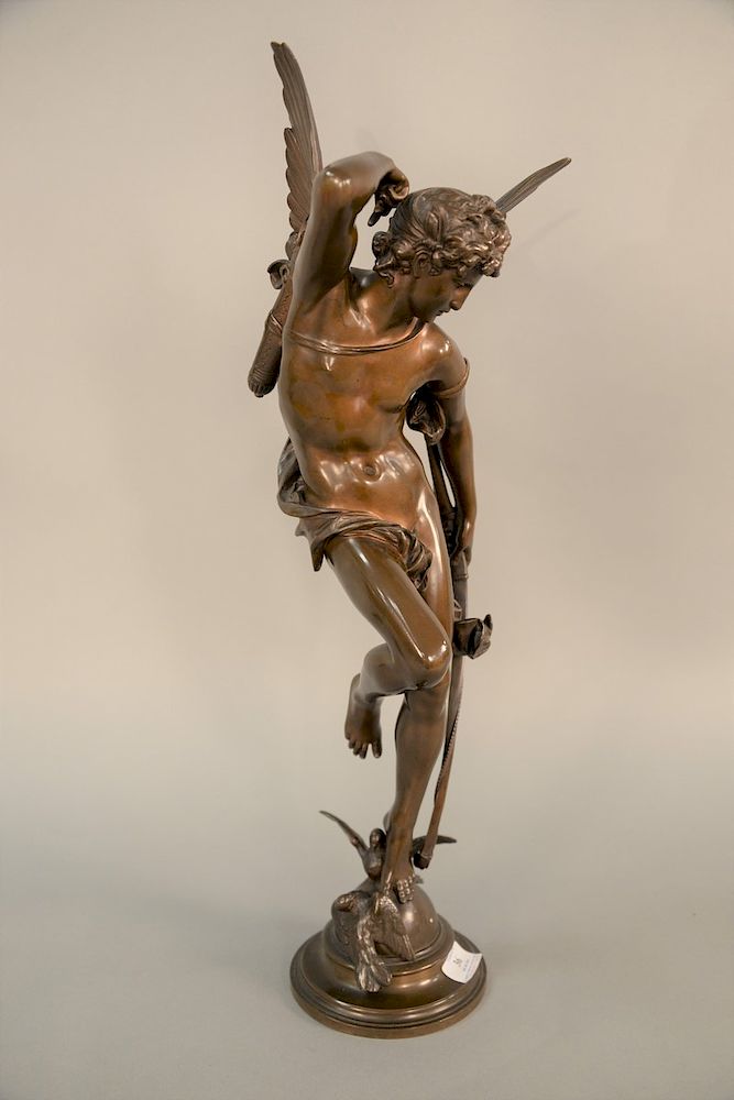 Appraisal: J Coutan bronze sculpture of cupid angel holding bow with