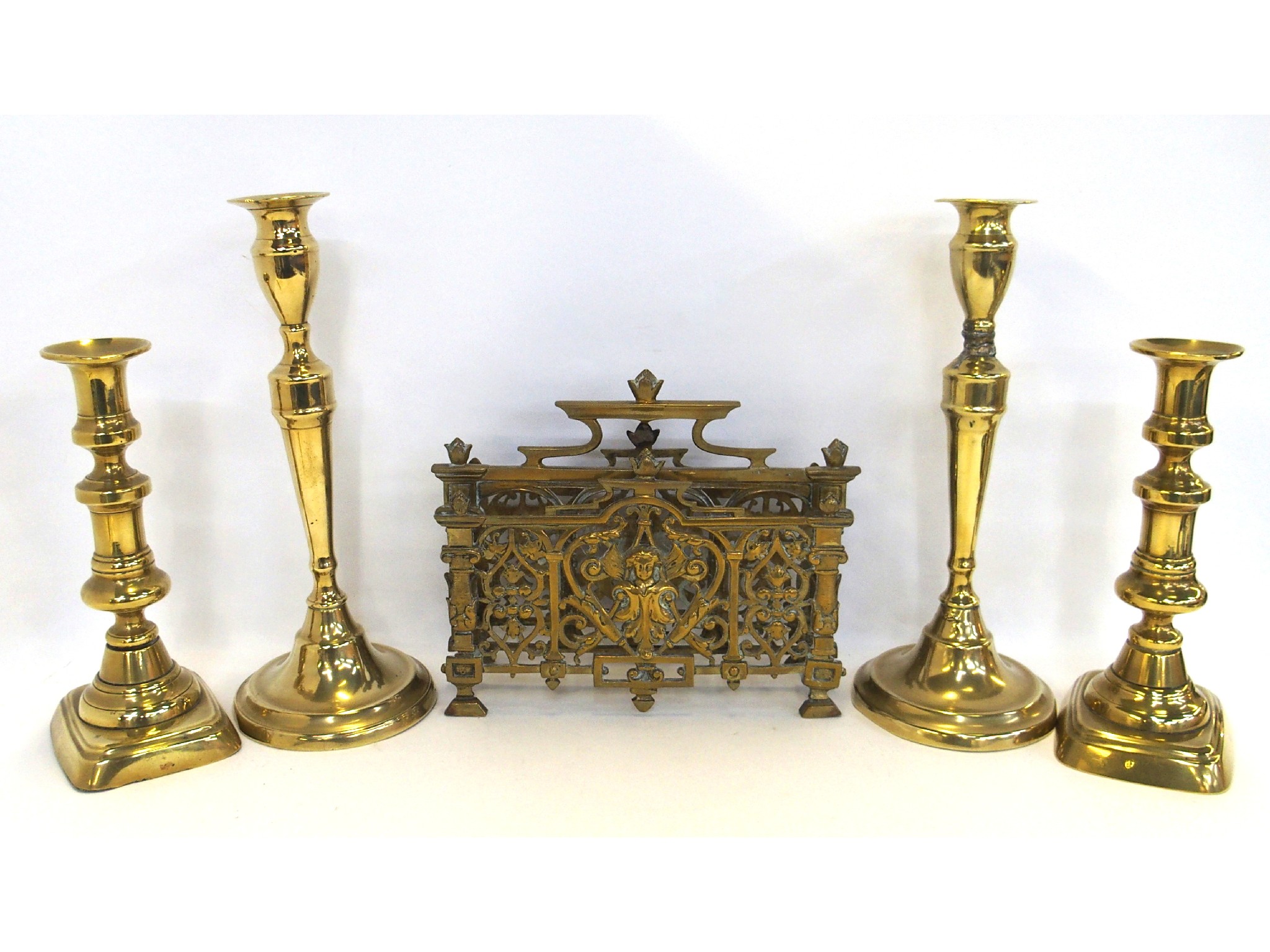 Appraisal: Victorian brass letter holder and two pairs of candlesticks