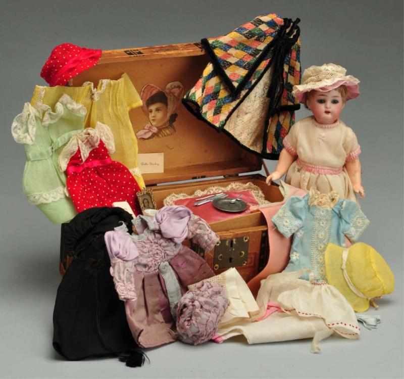 Appraisal: Kammer Reinhardt Child Doll with Trunk Description German bisque socket