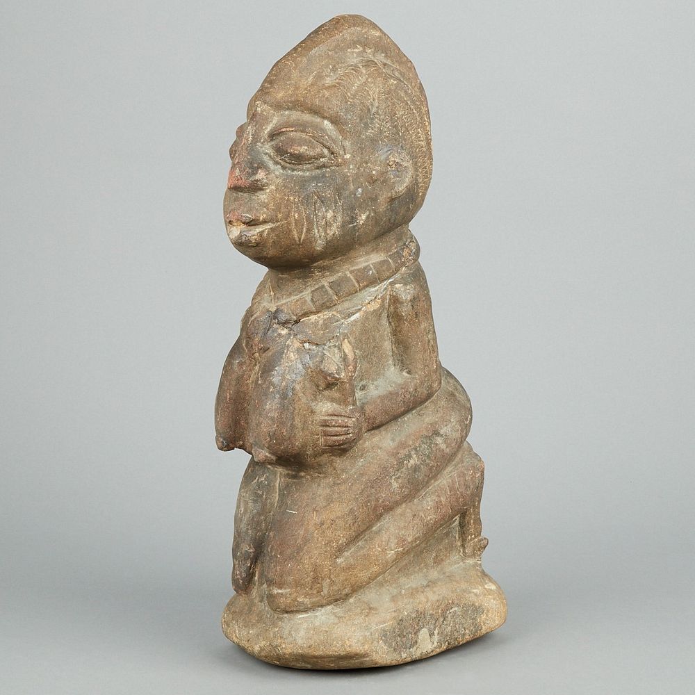 Appraisal: African Yoruba Kneeling Stone Figure Yoruba stone figure depicting a